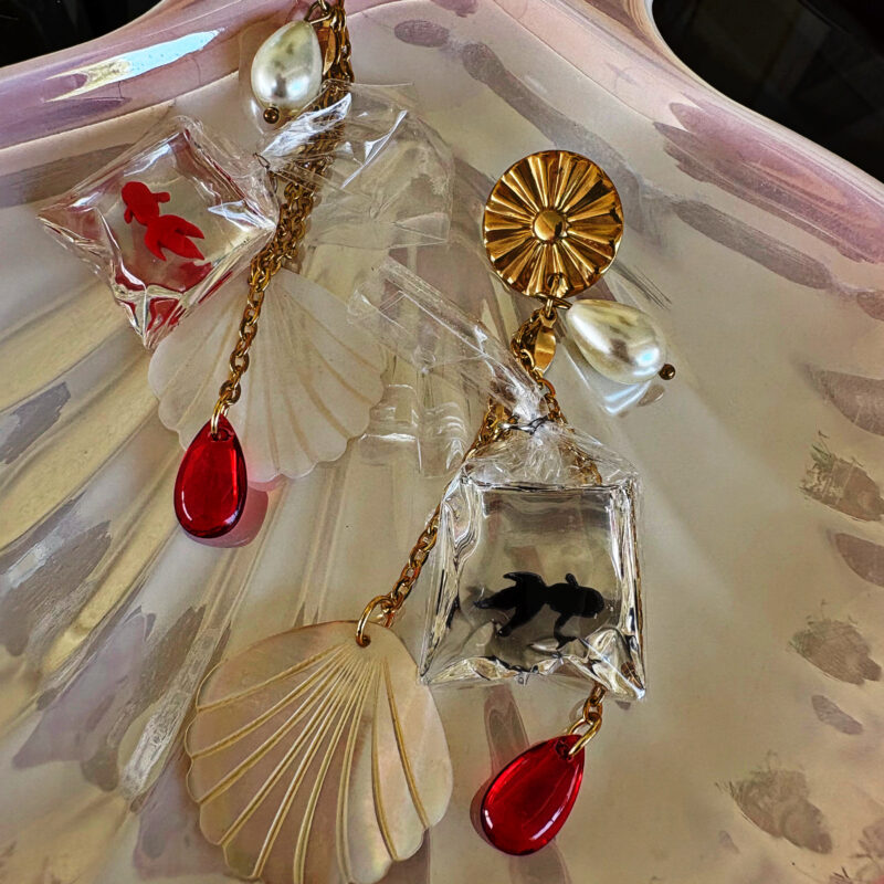 “Fish in a bag” earrings